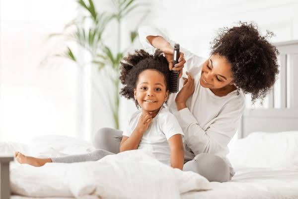 Detangling Tips For Managing Kids Curly Hair Without Pain
